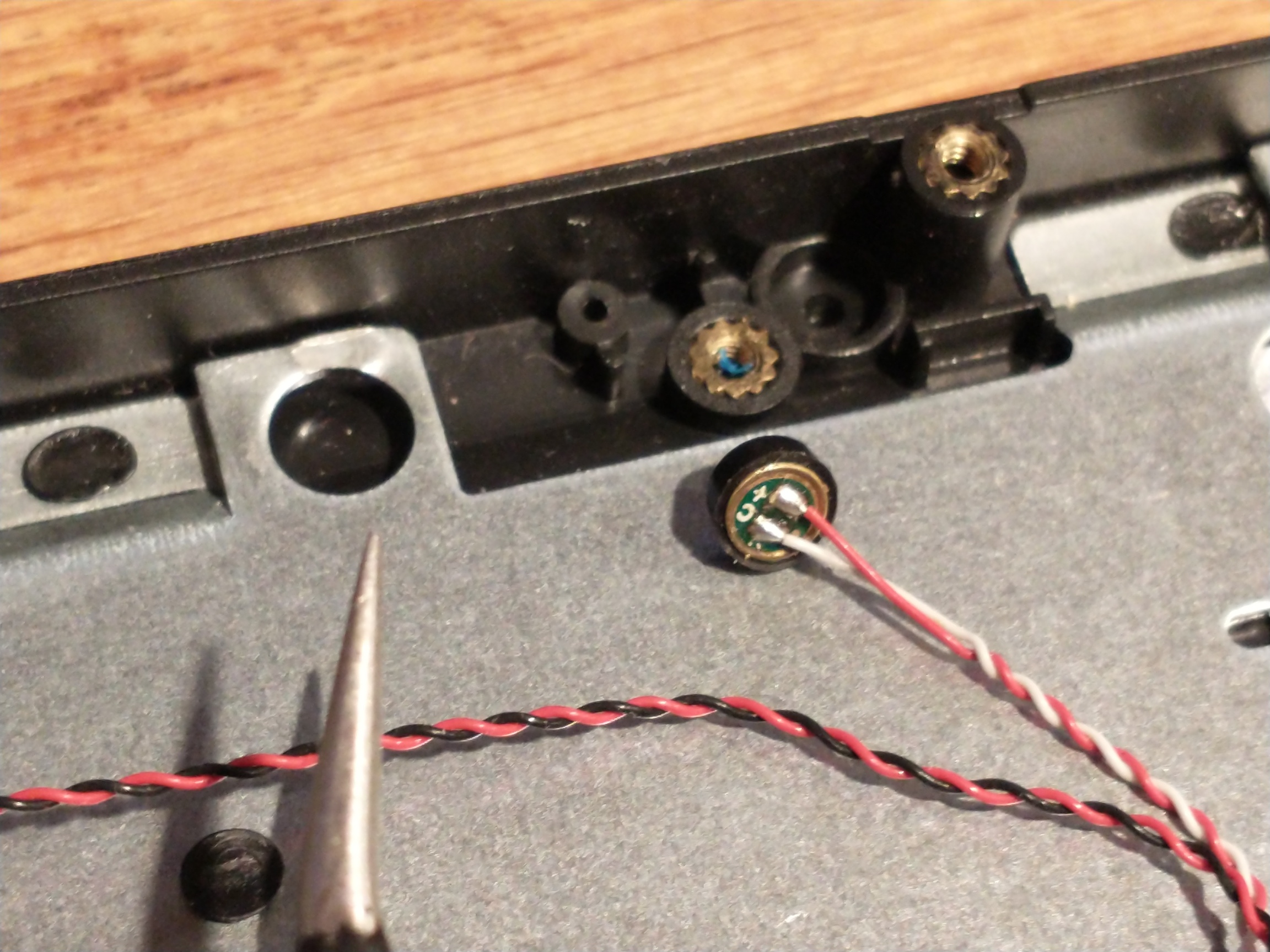 One of the Pinebook Pro microphones after removal One of the Pinebook Pro microphones after removal